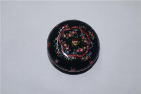 A Japanese ivory cane handle, a faux amber lion-dog and an enamel and ivory pill box